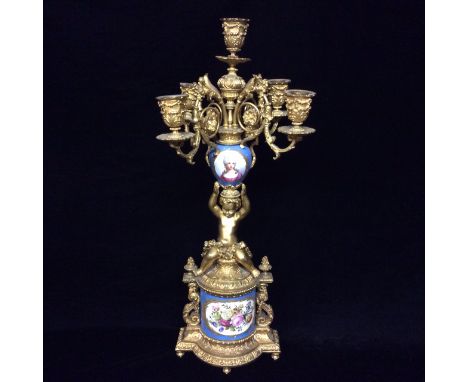 A 19TH CENTURY FRENCH PORCELAIN AND SPELTER ORMOLU FIVE BRANCH CANDLEABRA CIRCULAR SCONCES  With acanthus leaf decoration, ab