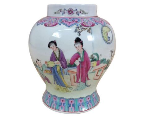 A CHINESE REPUBLICAN PERIOD VASE Decorated in enamel with a garden scene and script, Circa 1930. (19cm)