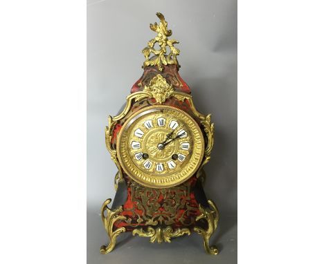 A LATE 19TH/EARLY 20TH CENTURY FRENCH BOULLE WORK MANTLE CLOCK The gilded dial with enamelled Roman numeral chapter ring, con