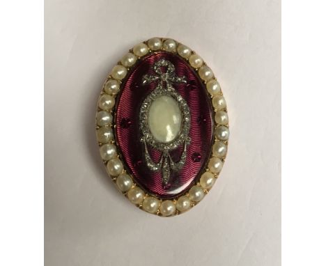 AN EARLY 19TH CENTURY GOLD, ENAMEL, PEARL AND DIAMOND SET BROOCH Elliptical pink guilloché enamel plaque to a pearl surround,