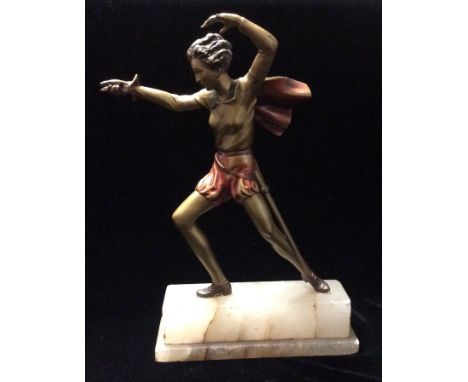 A 20TH CENTURY ART DECO SPELTER FIGURINE A lady fencer, cold painted with a gilt body and red shorts, carrying a scabbard, ra