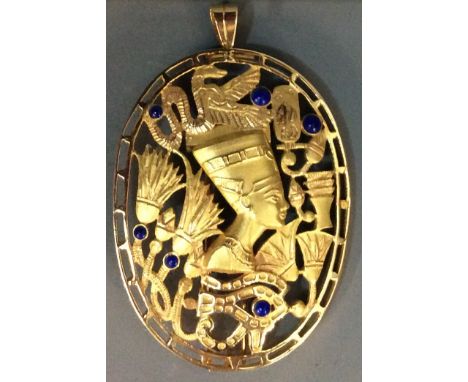 A VINTAGE EGYPTIAN 14CT GOLD AND LAPIS LAZULI PENDANT/BROOCH Having a profile portrait of an Egyptian Pharaoh, held in a pier