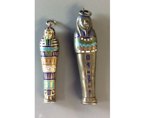 A RARE AND UNUSUAL PAIR OF SILVER AND ENAMEL PROPELLING PENCILS Formed as Egyptian Pharaohs with blue, red and green hierogly