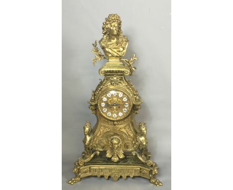 A LARGE AND IMPRESSIVE FRENCH 19TH CENTURY POLISHED BRASS CASED MANTLE CLOCK Crested with a portrait bust of Louis XIV above 