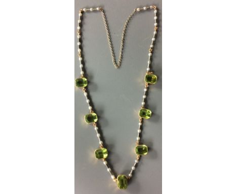 A LATE 19TH/EARLY 18TH CENTURY GOLD, PERIDOT AND SEED PEARL NECKLACE Having seven step cut peridots, interspersed with rows o