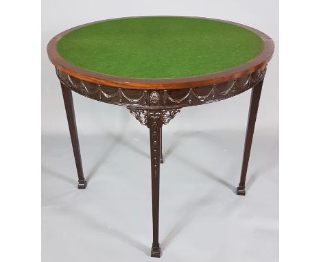 AN EDWARDIAN CHIPPENDALE REVIVAL MAHOGANY DEMILUNE CARD TABLE The folding top opening to reveal a green baize above applied s