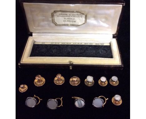 A COLLECTION OF EIGHT VICTORIAN 9CT GOLD AND MOTHER OF PEARL SHIRT COLLAR STUDS Contained in a velvet lined case, 'Muir & Son
