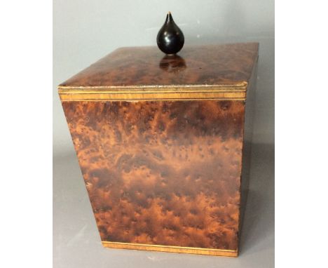 A 20TH CENTURY BURR WOOD TEA CADDY Rectangular shape with ebonized onion shape finial and tin lining. 