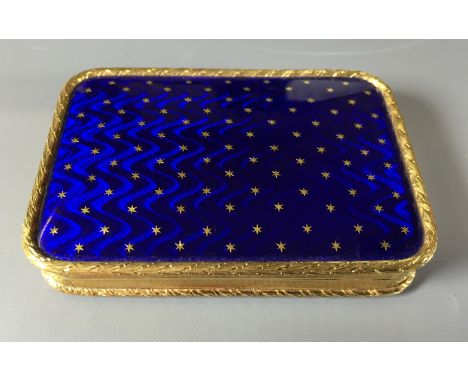 A GOOD 18CT GOLD SNUFF BOX Having a blue enamelled lid and underside set with gold star decoration, the edges with engine tur