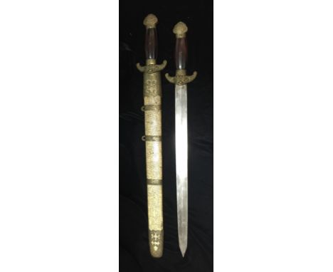 A LATE 19TH/EARLY 20TH CENTURY CHINESE 'SHUANGJIAN' DOUBLE SWORD  With flattened grips, gilt metal mounts and shagreen scabba