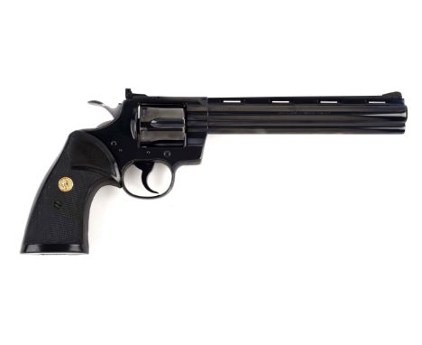 Manufactured in 1980.  Features Colt royal blue finish, six shot, double action, with the full vent rib, full bottom lug, bla
