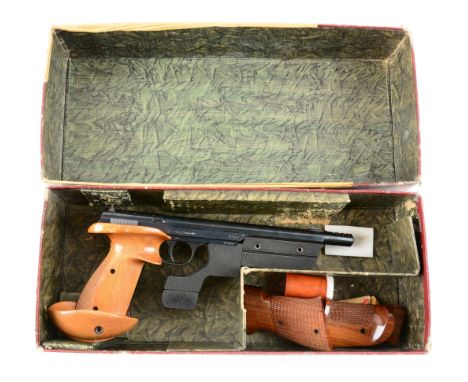 High quality, Swiss made, semi automatic target pistol. Blued finish, muzzle break, adjustable rear sight, comes with two pai