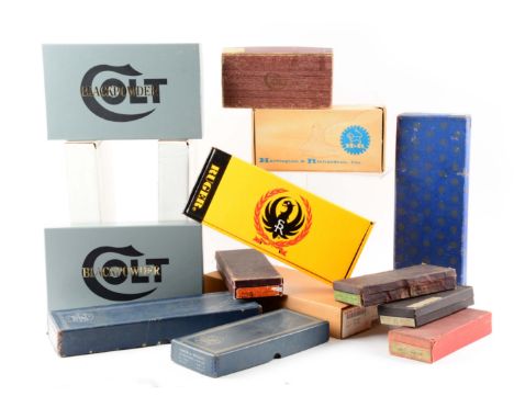 This lot includes three turn of the century Smith & Wesson boxes. No. 1 red box, tan label, nude departure, .38 caliber, blue