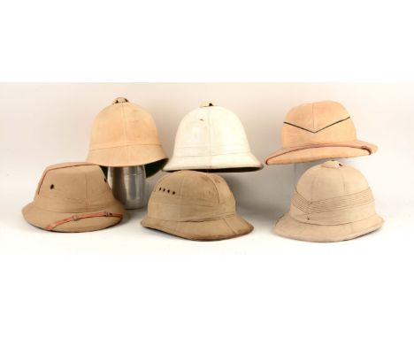 Various patterns of British or European military and civilian/private purchase helmets or hats for tropical or hot weather se