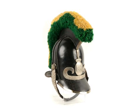 Black leather Bavarian helmet with green and yellow crest. Silver plate with "R" and crown.  Reading "FUR CHTLOS UND TREW". W