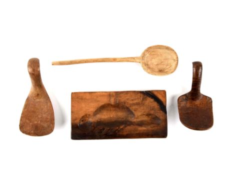A) 18th century ladle with relief carved beaver effigy on bottom.  Wood is light in color, in great condition, with a dry pat