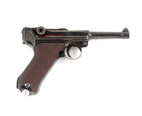 Manufactured by Mauser for certain units in Germany.  This pistol bears the 1940 date on chamber, Mauser banner on toggle.  A