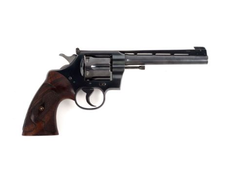 This revolver was built in 1937 and went to King Gun Sight Company for the full custom target treatment to include Colt King 