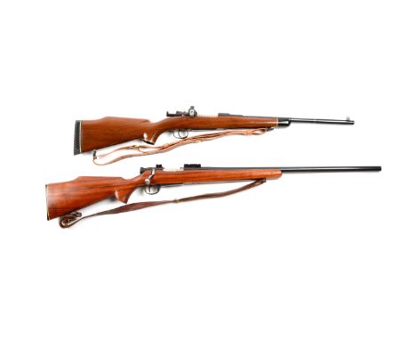 Gun (A) is a custom short rifle built from a 1901 Swedish Mauser action. Caliber not marked so we will assume it's original 7