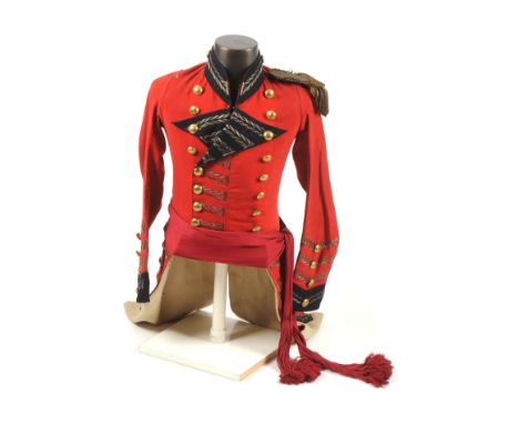 Double breasted tail coat of scarlet super fine with dark blue standing collar lapels and cuffs. The facings all finished wit