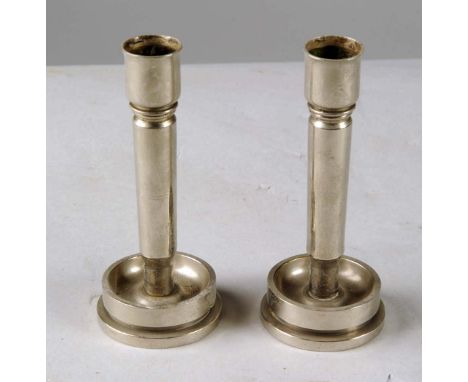 Each trench art candlestick easily separates into two pieces, a base made from a 40MM M25 casing dated 1943 and shaft. 