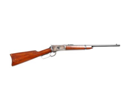 This special order Carbine features a half magazine and is chambered for the popular .38-40 cartridge.  Manufactured in 1912.