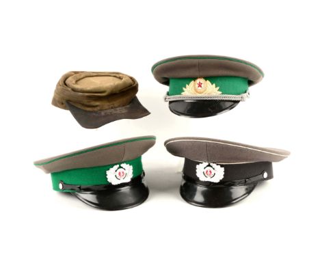 Including three Cold War era, visored Soviet/USSR Army military caps, all with gray bodies.  All in VG condition.  1)  office