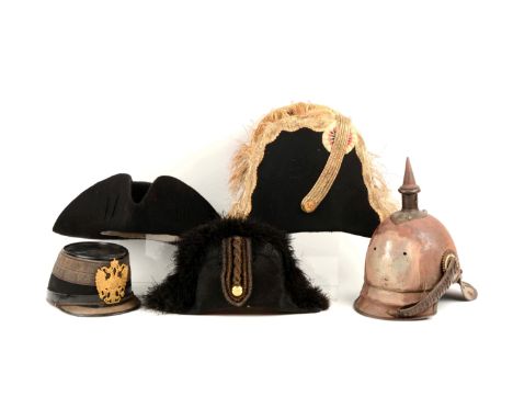 Includes a relic pickelhaube helmet, rusted, missing parts, missing leather lining with only one scale chin strap;  a Austria