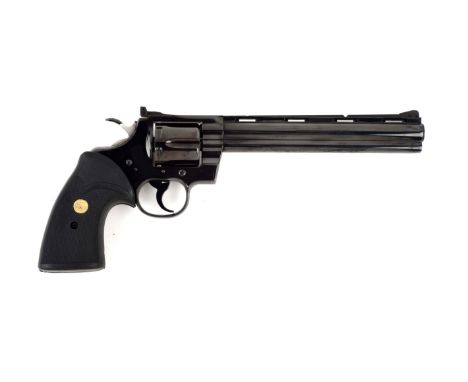 Colt introduced the Python Hunter in 1981.  This early example does not have the white lines or the red ramp.  Standard featu