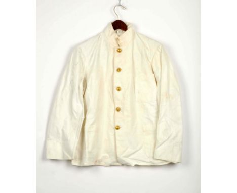 Single breasted, white cotton canvas with three patch pockets in front. Five half dome brass buttons marked, "LEGION ETRANGER