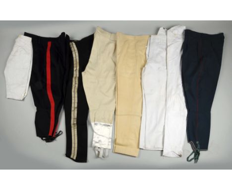 Comprised of: 1) Late 19th century, dark blue British horseman's wool trousers, four fly buttons, white side stripes, stainin