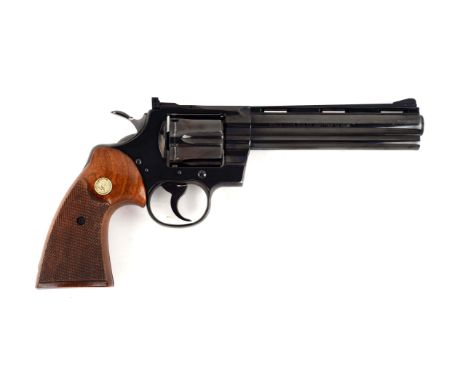 Features Colt royal blue finish, vent rib, full lug, six shot, double action, adjustable rear sight, black front sight, wide 