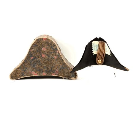 Black, fur-felt chapeau with original white silk liner, but leather sweatband missing inside.  Ends trimmed with gold bullion