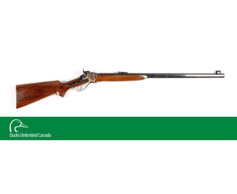This is a finely made Sharps sporting rifle that features the full heavy octagon barrel, rich blue, globe front sight, Sharps