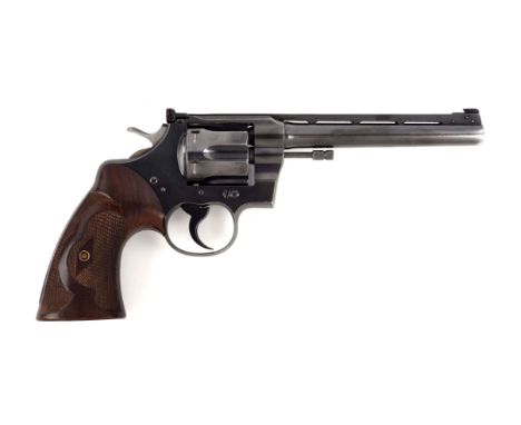 This revolver was built in 1939 and went to King Gun Sight Company for the full custom target treatment to include Colt King 