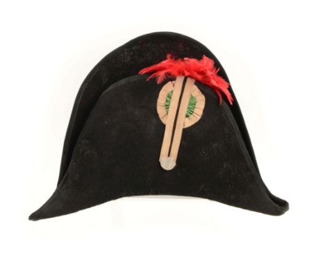 The high-back black wool chapeau with two strip white tape loop with green and white rosette, red feather plume and nickel-fi