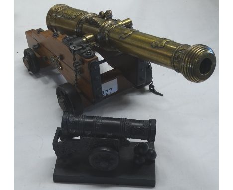 2 MODEL CANNONS 