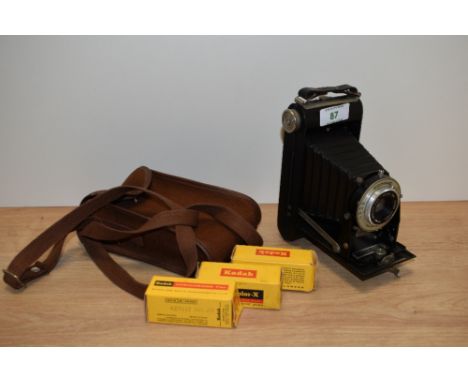 A vintage Kodak Brownie camera.