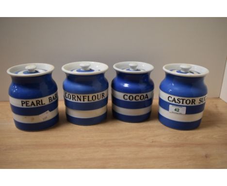 Four T G Green Cornish wear storage jars; Castor sugar, Pearl barley, Cornflour and Cocoa.
approx 13cm each