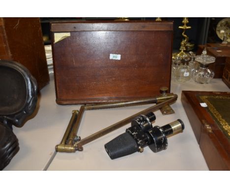 An interesting mahogany navigation table, of nautical interest, measuring 40cm wide, associated Charles Perry binoculars, and