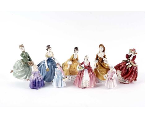 A collection of Royal Doulton decorative ceramic figures, including: 'Coralie' HN 2307; 'Sandra' HN 2275; 'Marie' HN 1370; 'T