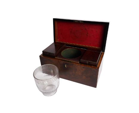 A late 19th Century walnut tea caddy, with brass handle to its hinged lid, opening to reveal three compartments, the outer tw