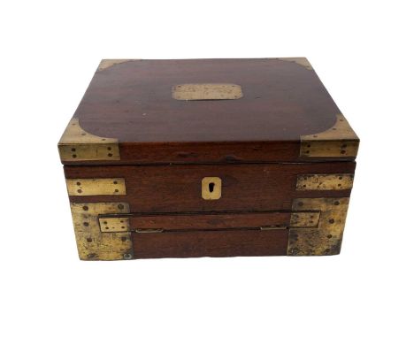 A 19th Century mahogany hectograph, with inlaid brass cartouche, handles, and mounts, the hinged lid opening to reveal an uph