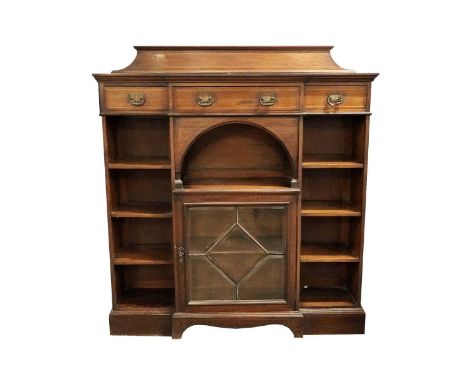 An Edwardian inlaid mahogany and satinwood banded break front bookcase, with moulded gallery back on break front shaped top, 