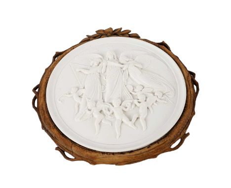 A decorative ceramic wall plaque depicting three angels surrounded by cherubs, in the manner of Royal Copenhagen, all modelle