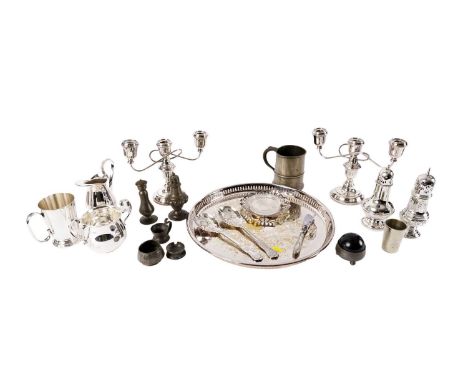 A selection of silver plate including: two candelabra; two sugar casters; a tea tray; and other items; together with pewter w
