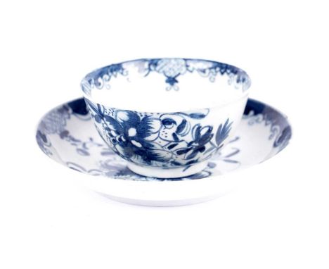 A 19th Century Worcester 'Mansfield' pattern tea bowl and saucer, with blue floral decoration, the bowl 7.5cms diameter.