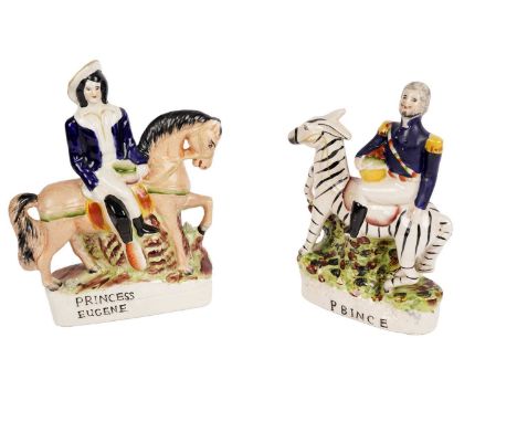 A pair of vintage Staffordshire flatback figures, both modelled on horse/zebra back, the tallest 23cms.