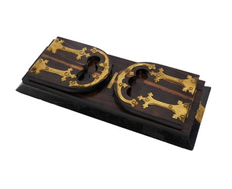 A Victorian Betjemann's Patent coromandel wood and lacquered brass mounted folding extending book trough, patent no.18222, of
