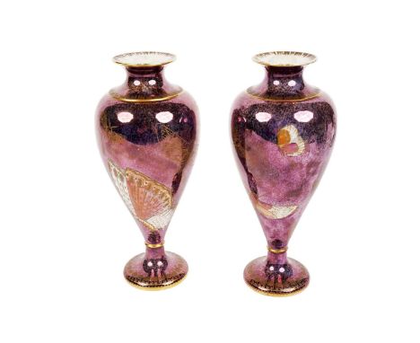 A pair of Carlton Ware Armand Lustre baluster vases, with butterfly decoration on a mottled ground and gilt detailing, raised